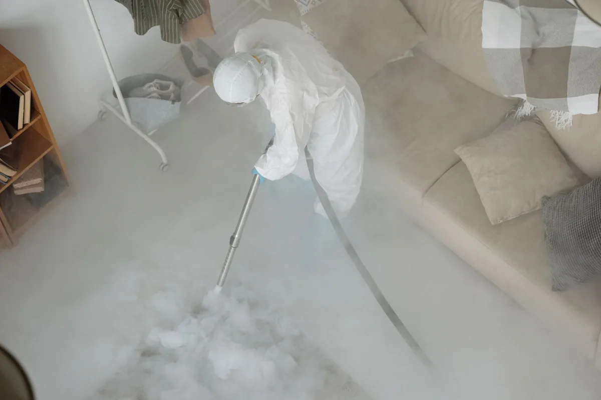 Biohazard cleanup technician in protective equipment, New Springville / Willowbrook / Bulls Head / Travis, New York, NY